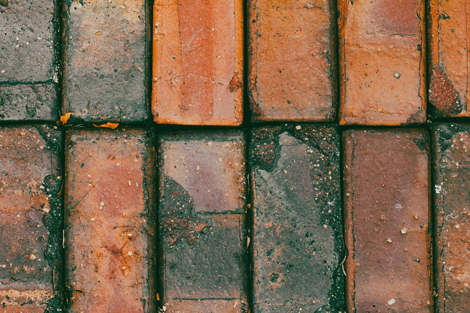Weathered paver surface showing long-term wear in Florida