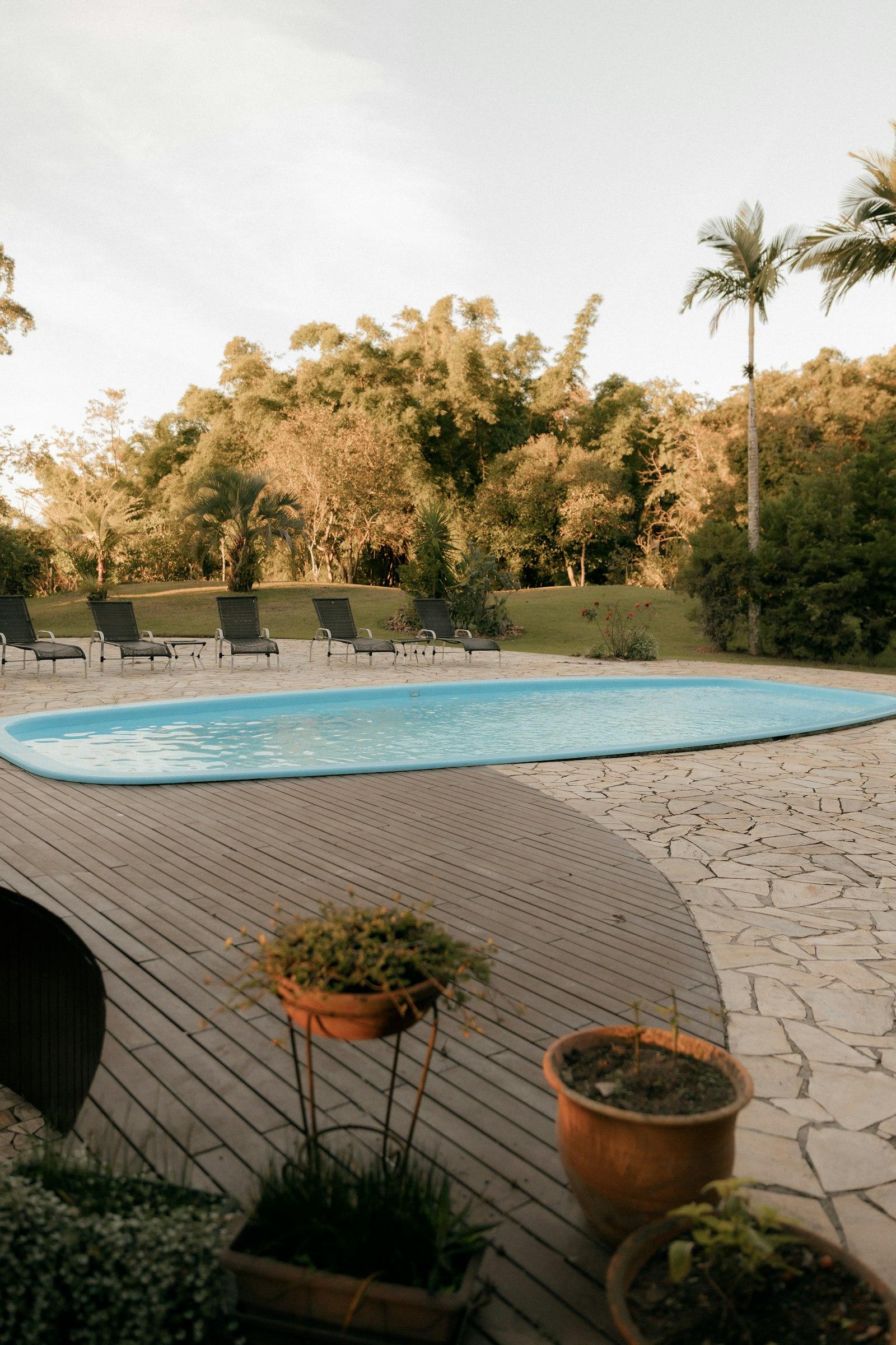 Natural stone travertine pavers replacing a concrete surface