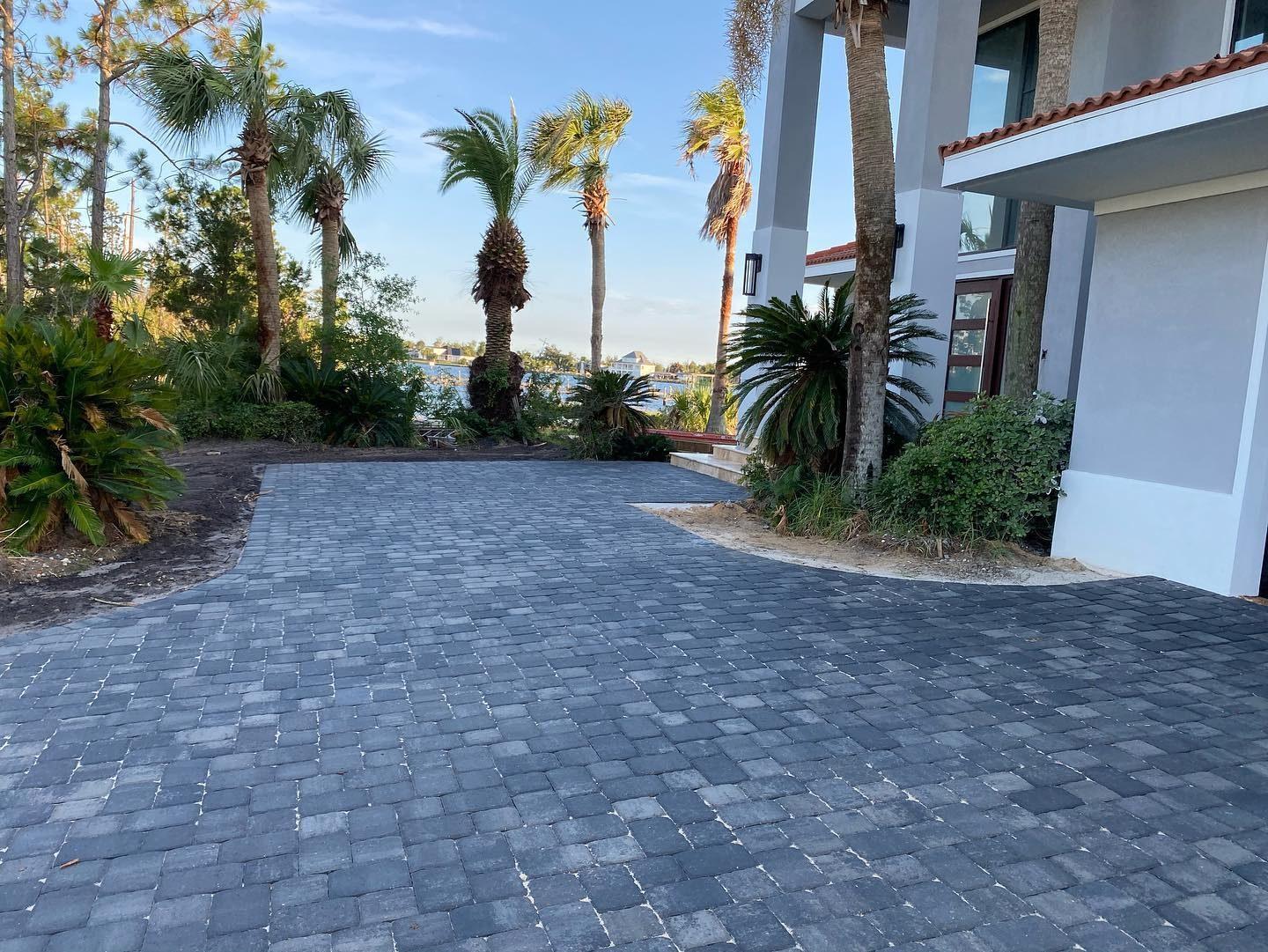 Paver driveway replacing builder concrete near Horizon West, FL