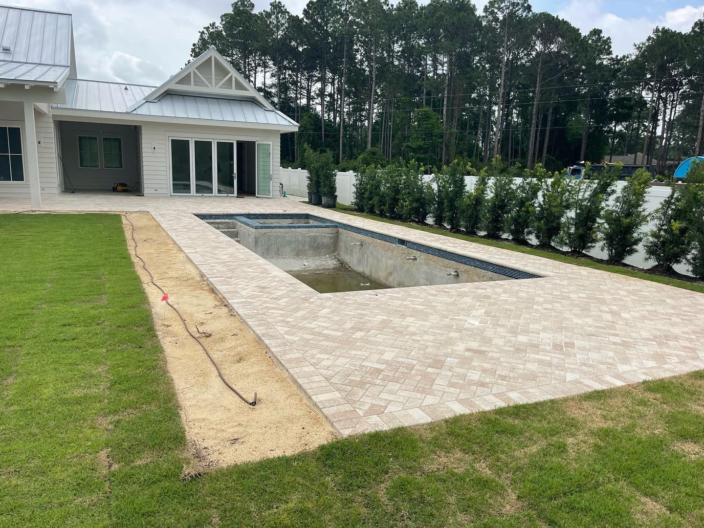 Travertine pool deck and outdoor living space near Bay Hill, Orlando FL