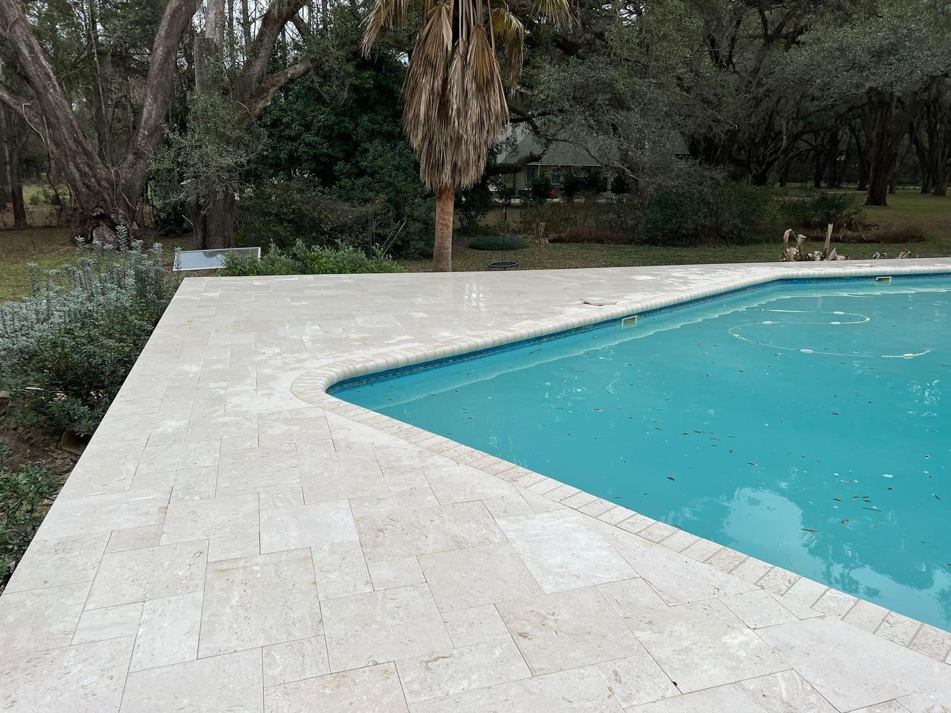 Travertine pool deck and pool in Dr. Phillips, Orlando FL