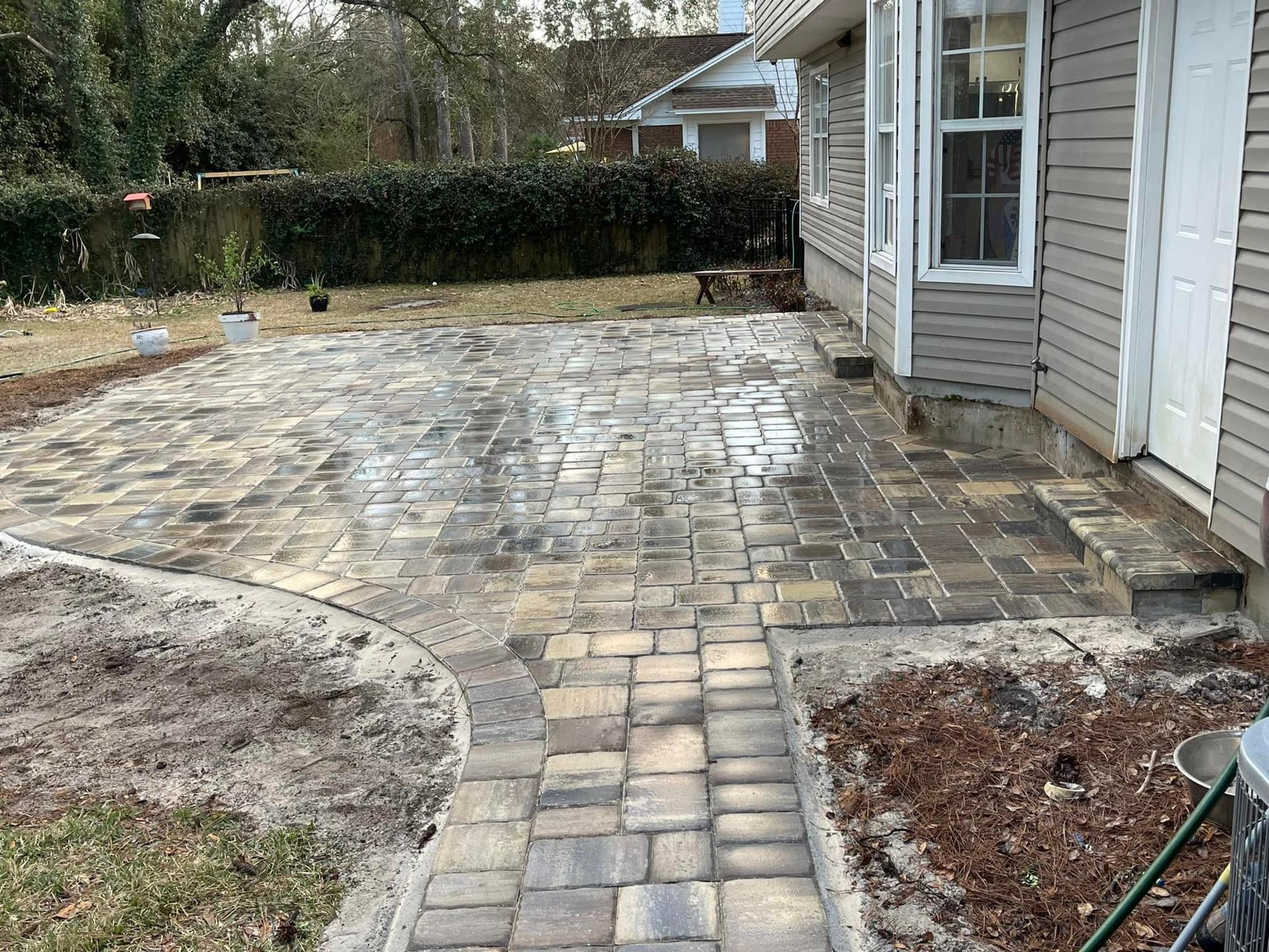 Paver installation in progress on an Orlando, FL property